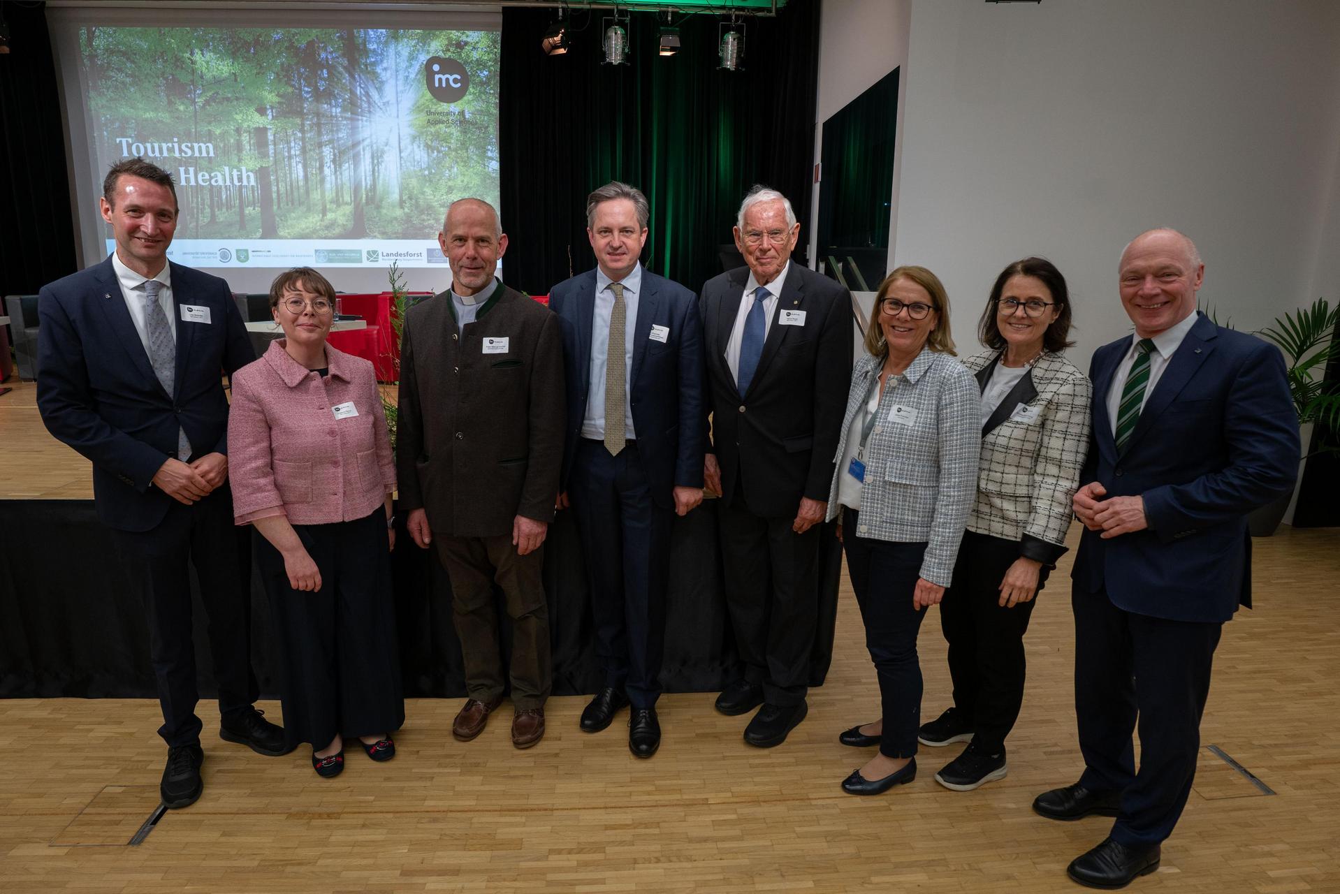 Besucher*innen und Vortragende beim Symposium „Tourism goes Health“