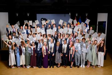 Alumni at their graduation ceremony