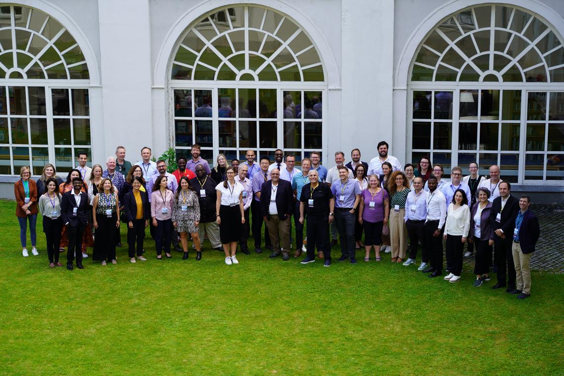 group of scientists at the Alternative Finance Conference