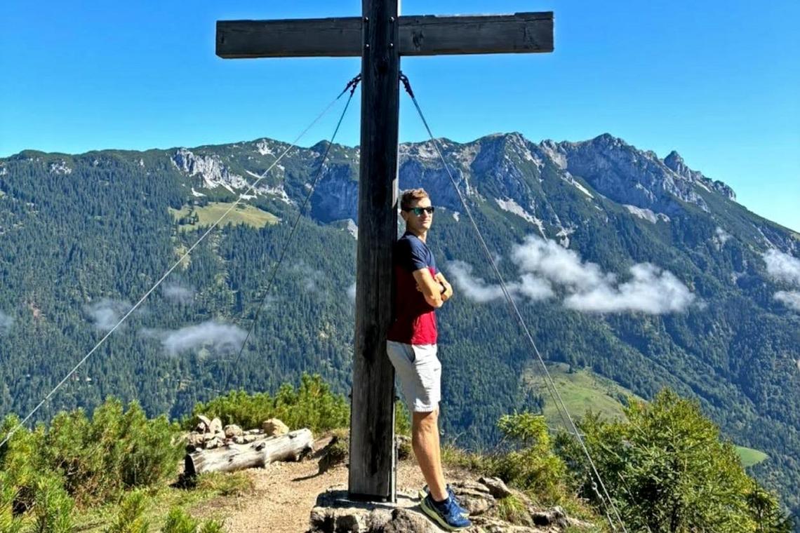 Fabian Myslik at the top of a mountain